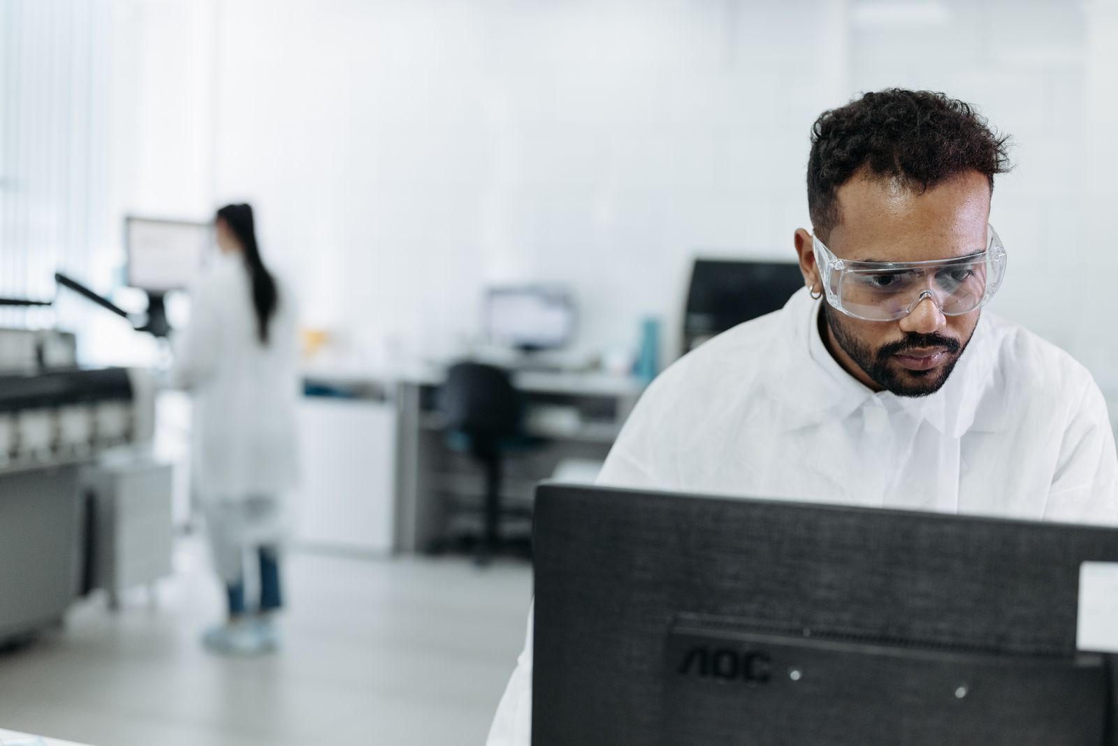 Scientist reviewing research data in a laboratory