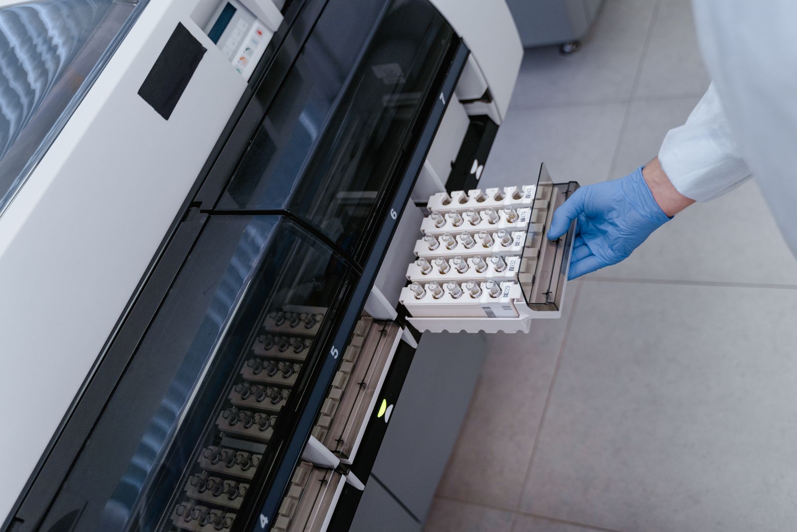 Laboratory technician working with advanced research equipment